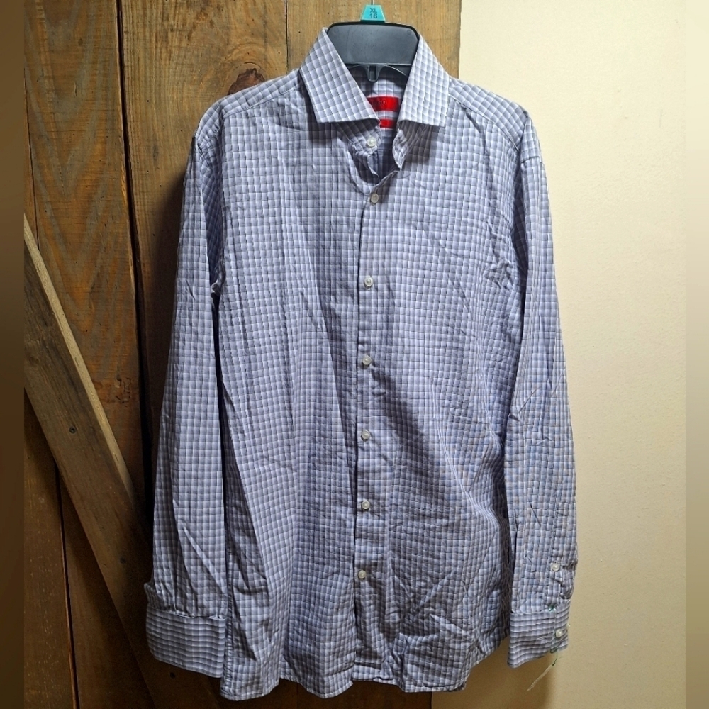 A Hugo Boss long sleeve button-down shirt in a men's size large. EUC.